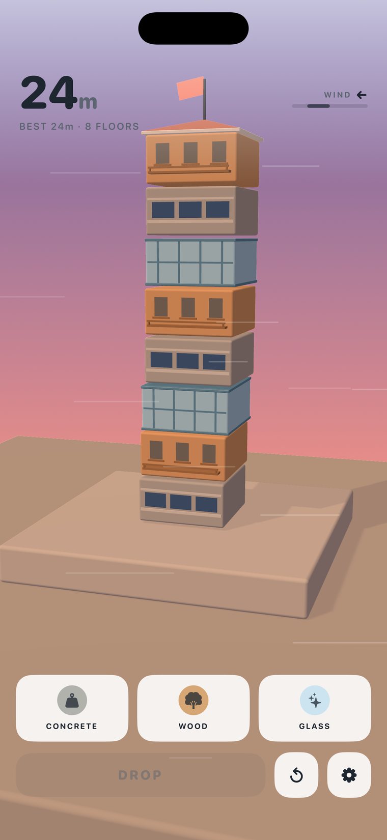Windframe at sunset: an eight-floor tower of wood and glass standing 24 metres tall, a flag streaming from the roof.